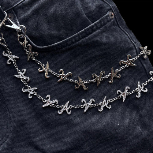 *A* Chaîne de pantalon en argent