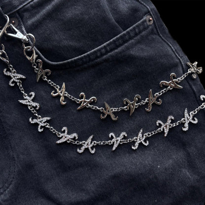 *A* Chaîne de pantalon en argent